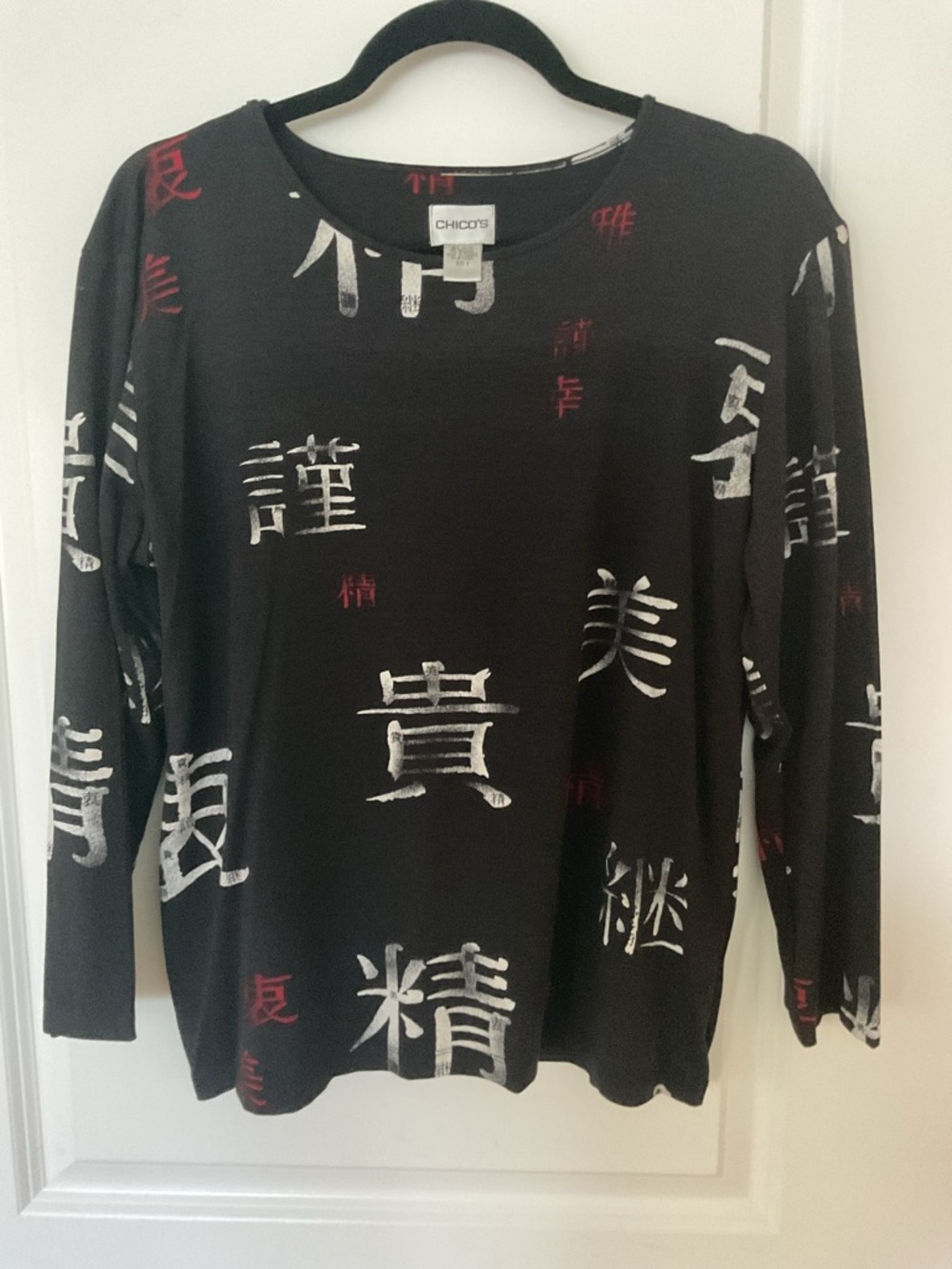 Chico's Black Top with White and Red Graphic Accents